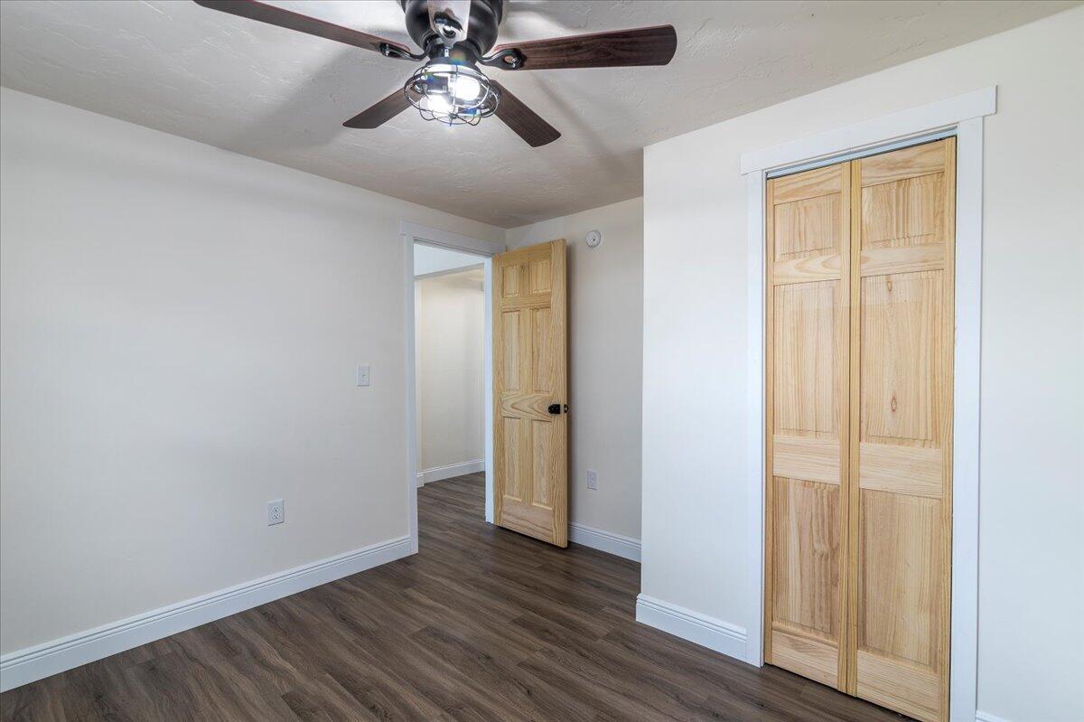36 Nutmeg Lane Penhook, VA 24137 - Photo 23 of 37 an empty room with wooden floor closet and windows