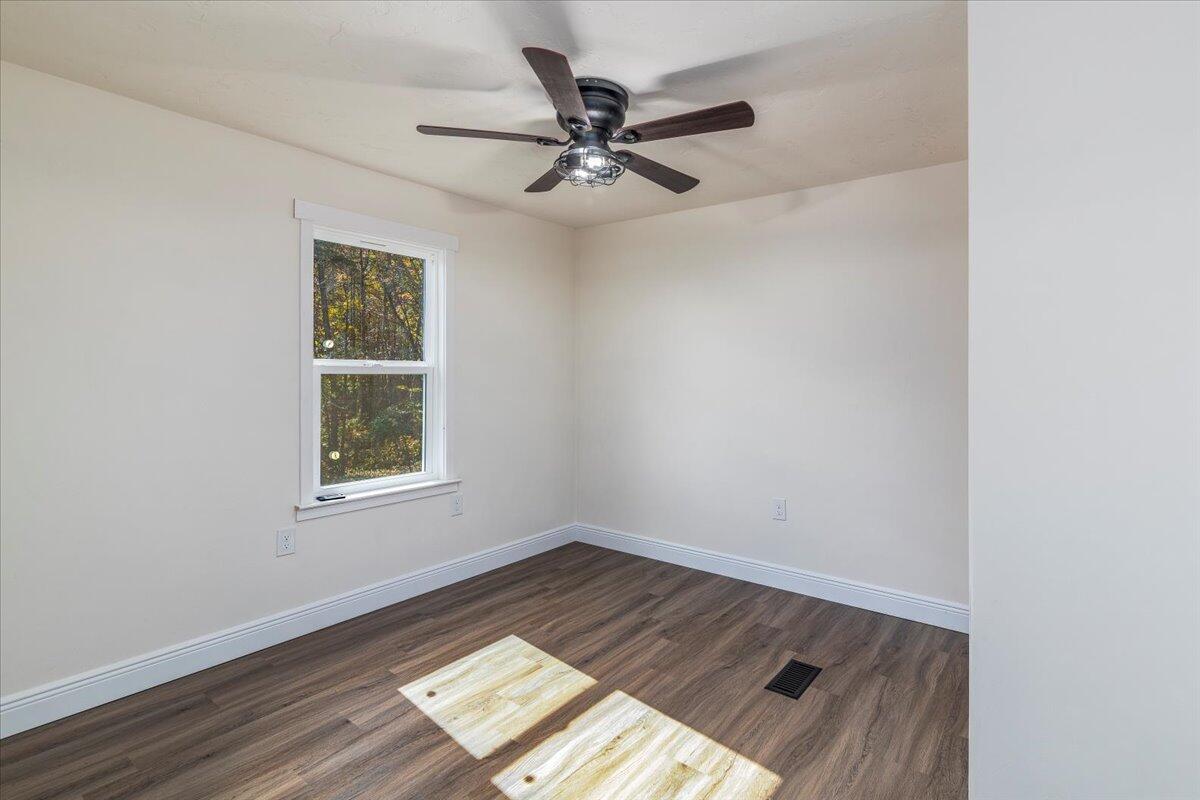 36 Nutmeg Lane Penhook, VA 24137 - Photo 24 of 37 an empty room with wooden floor closet and windows