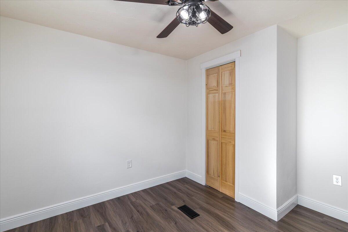 36 Nutmeg Lane Penhook, VA 24137 - Photo 25 of 37 an empty room with wooden floor closet and windows