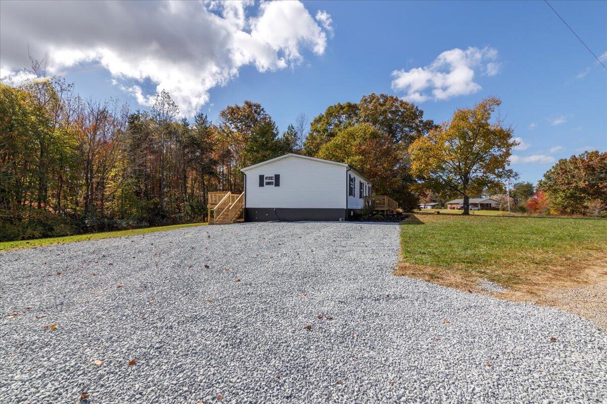 36 Nutmeg Lane Penhook, VA 24137 - Photo 37 of 37 a view of a house with a yard