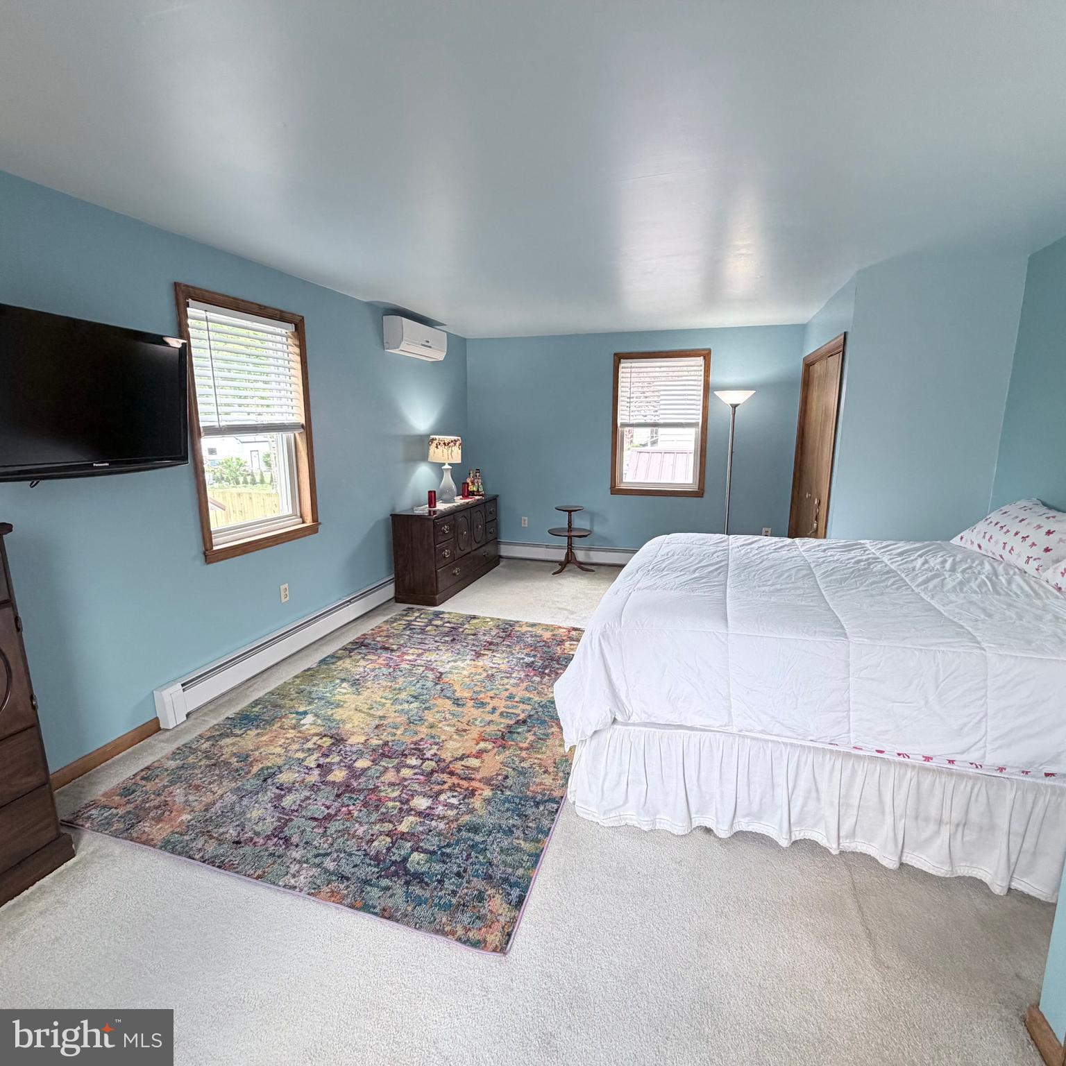 12997 Main Street Fort Loudon, PA 17224 - Photo 27 of 48 a bedroom with a bed and a flat screen tv