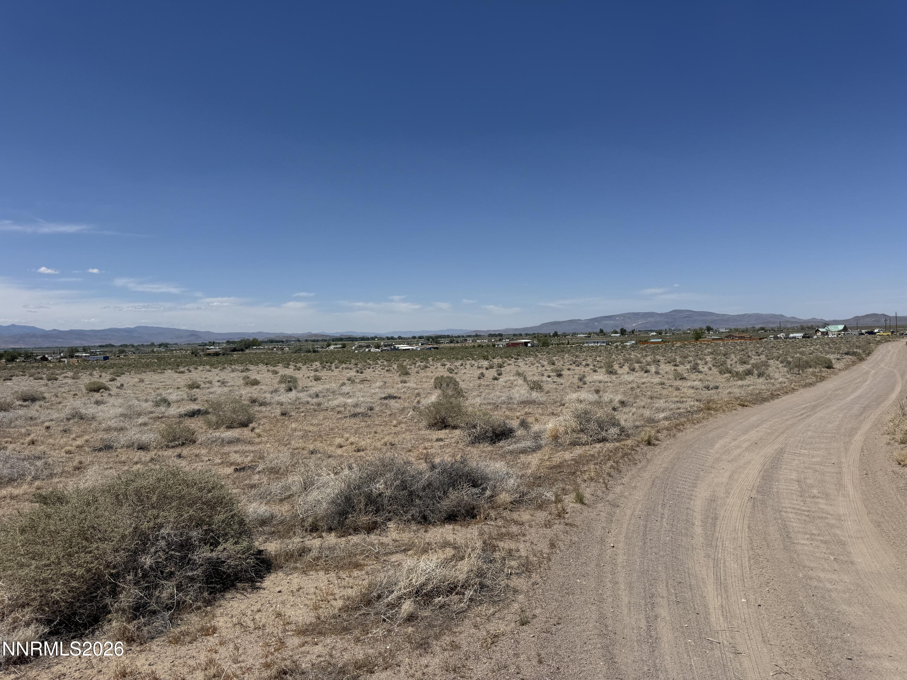 0 Rock Road Yerington, NV 89447 - Photo 6 of 12 a view of a dry yard with wooden floor