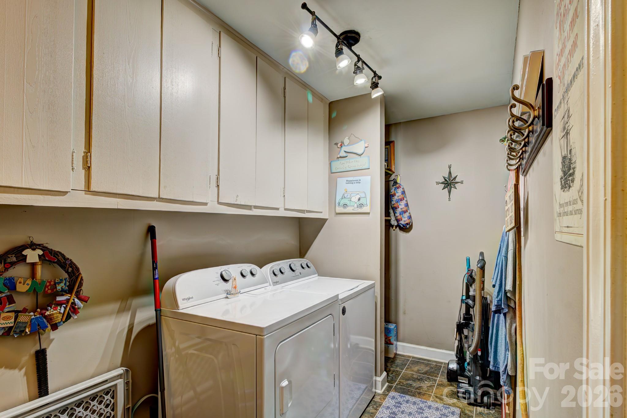 113 Delview Drive Cherryville, NC 28021 - Photo 17 of 26 a view of storage and utility room with two washing machine