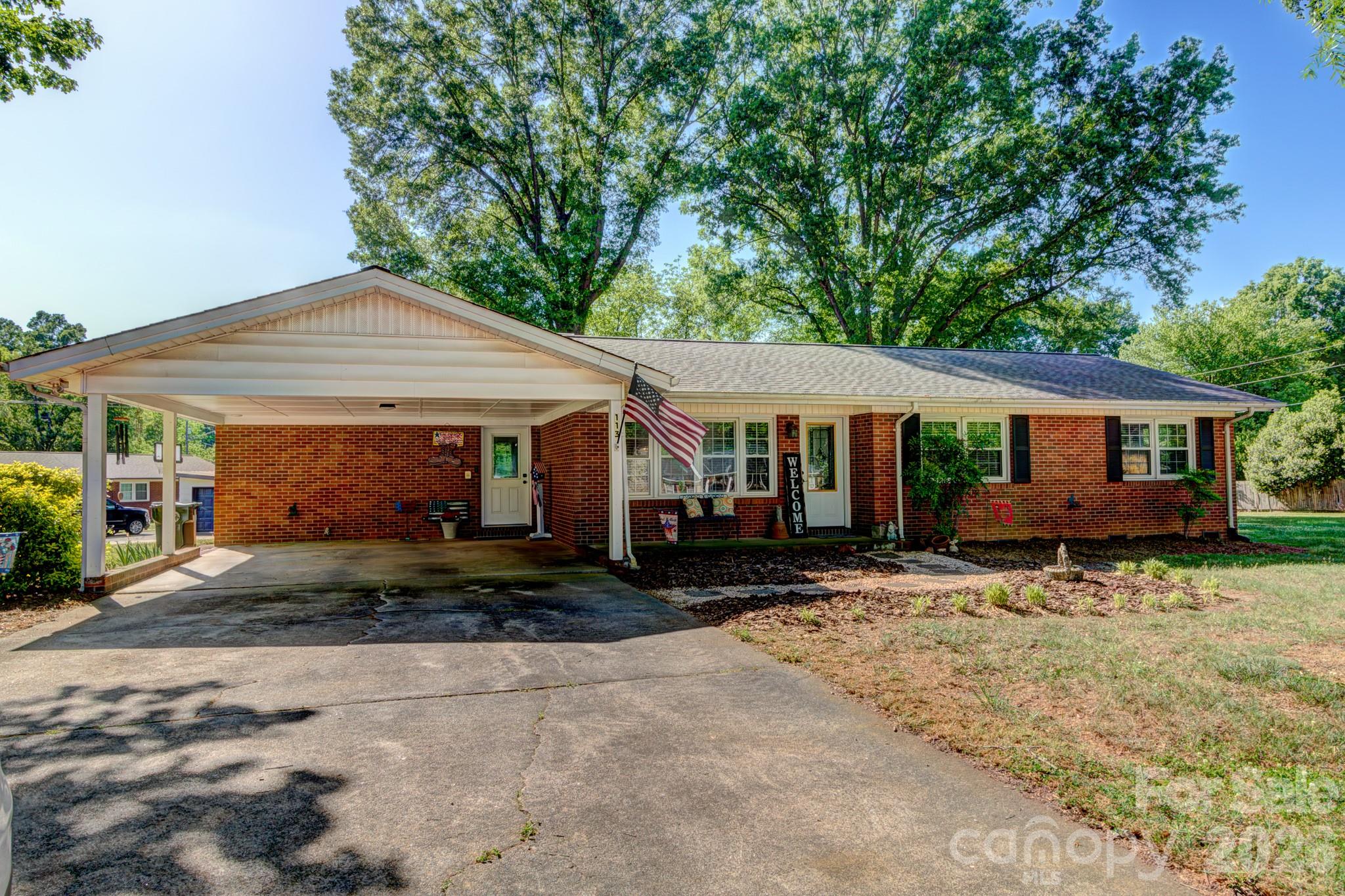 113 Delview Drive Cherryville, NC 28021 - Photo 2 of 26 a front view of a house with a yard
