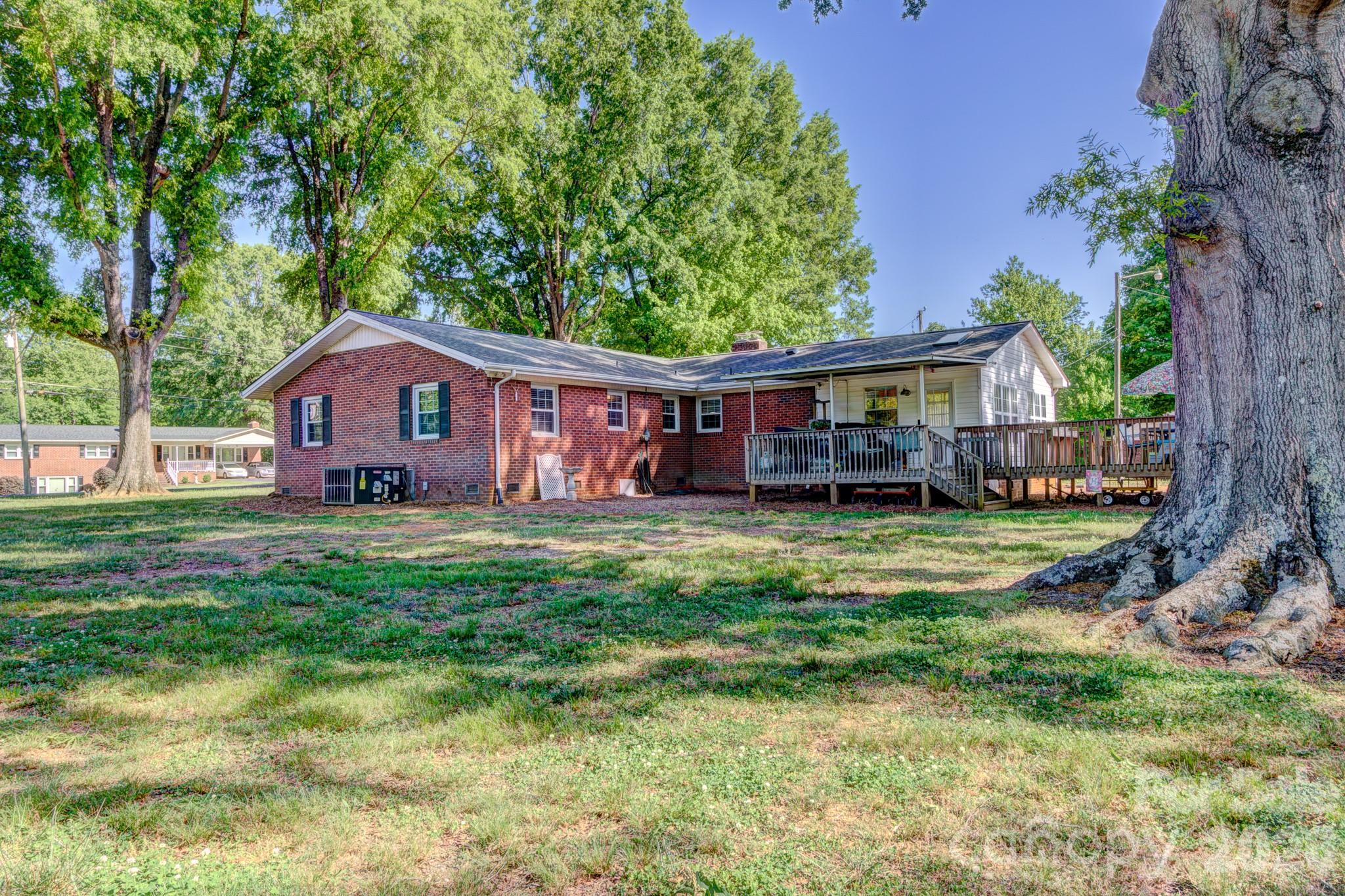113 Delview Drive Cherryville, NC 28021 - Photo 21 of 26 a front view of a house with garden