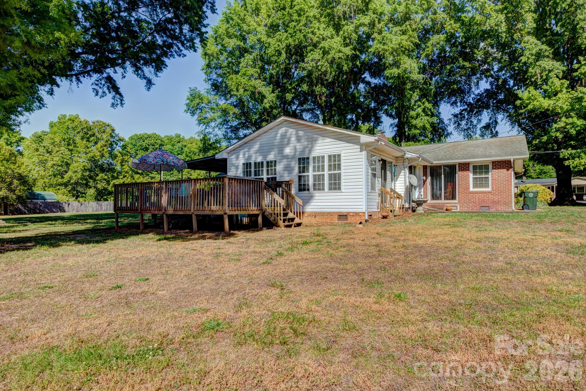 113 Delview Drive Cherryville, NC 28021 - Photo 22 of 26 a front view of a house with garden