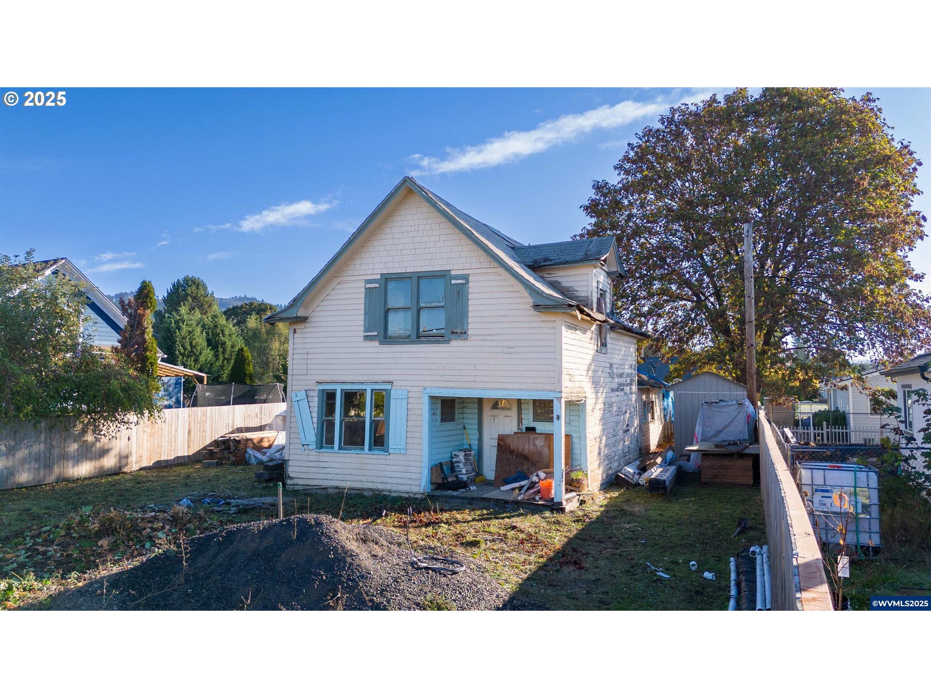 109 South Trade Street Amity, OR 97101 - Photo 5 of 8 a black and white photo of a house