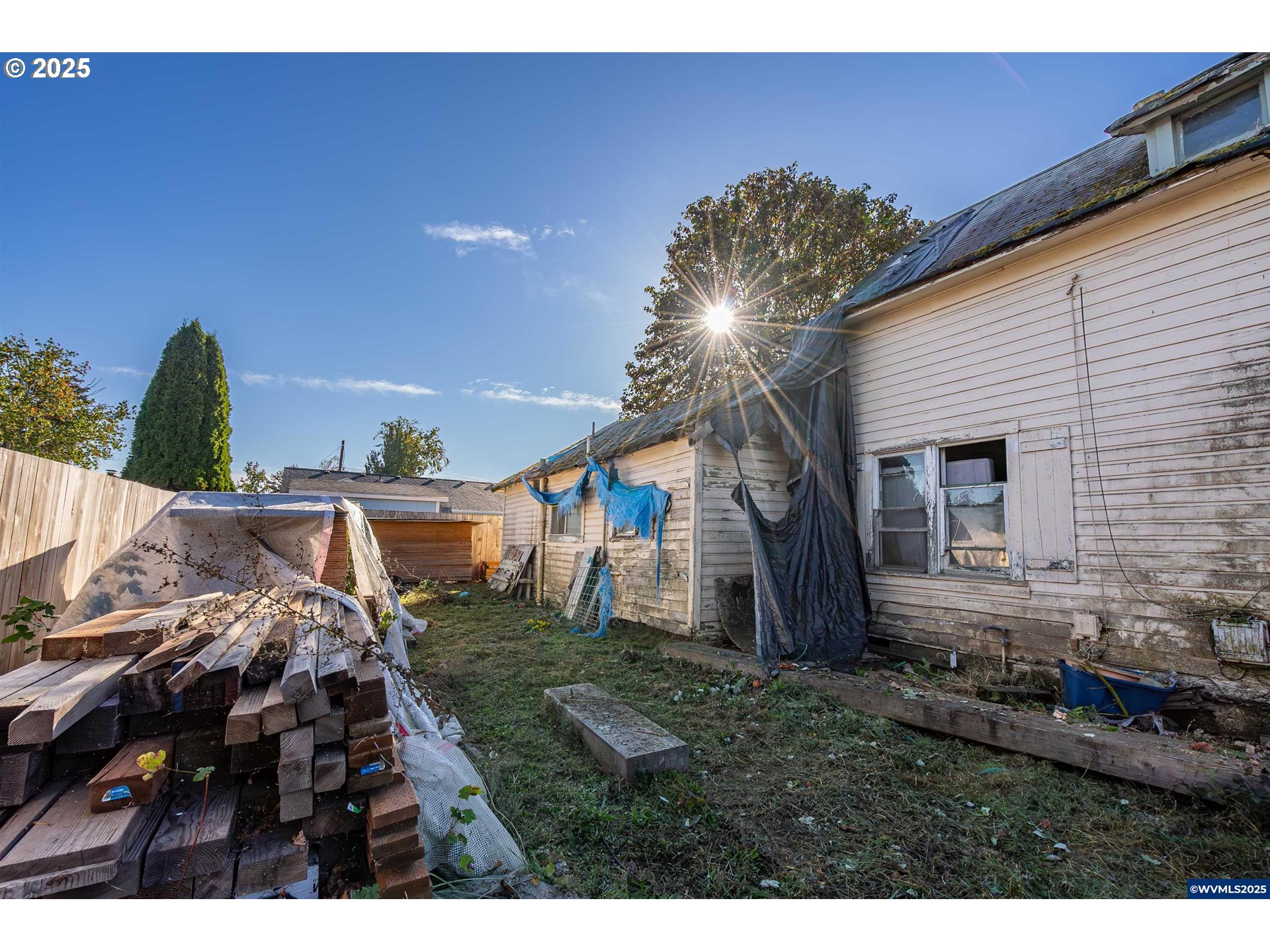 109 South Trade Street Amity, OR 97101 - Photo 6 of 8 a backyard of a house with lots of green space