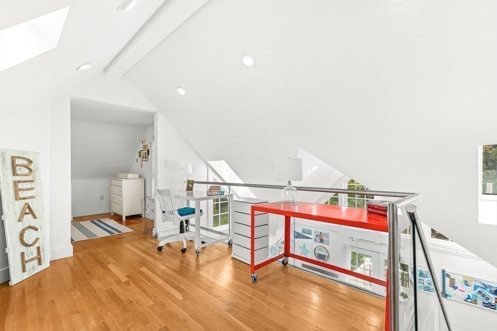 104 Church Street Winchester, MA 01890 - Photo 23 of 42 a bedroom with a bed and gym equipment