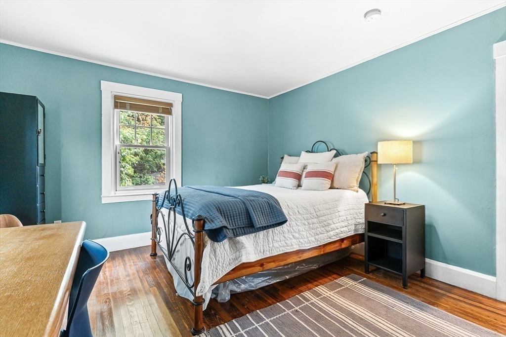 104 Church Street Winchester, MA 01890 - Photo 29 of 42 a bedroom with bed and a window