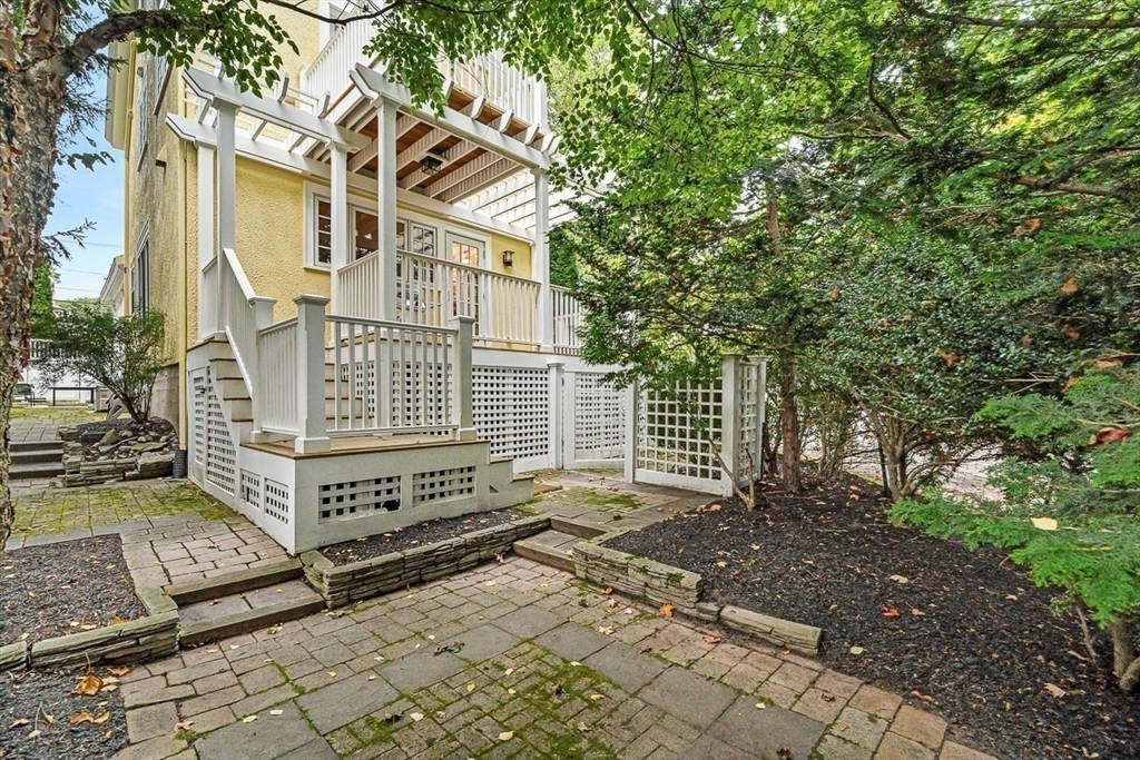 104 Church Street Winchester, MA 01890 - Photo 32 of 42 a front view of a house with a yard