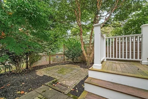 a view of a backyard with a deck