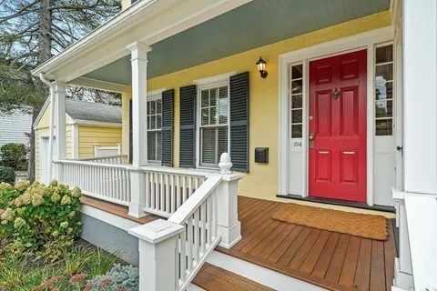 a view of front door with a chair