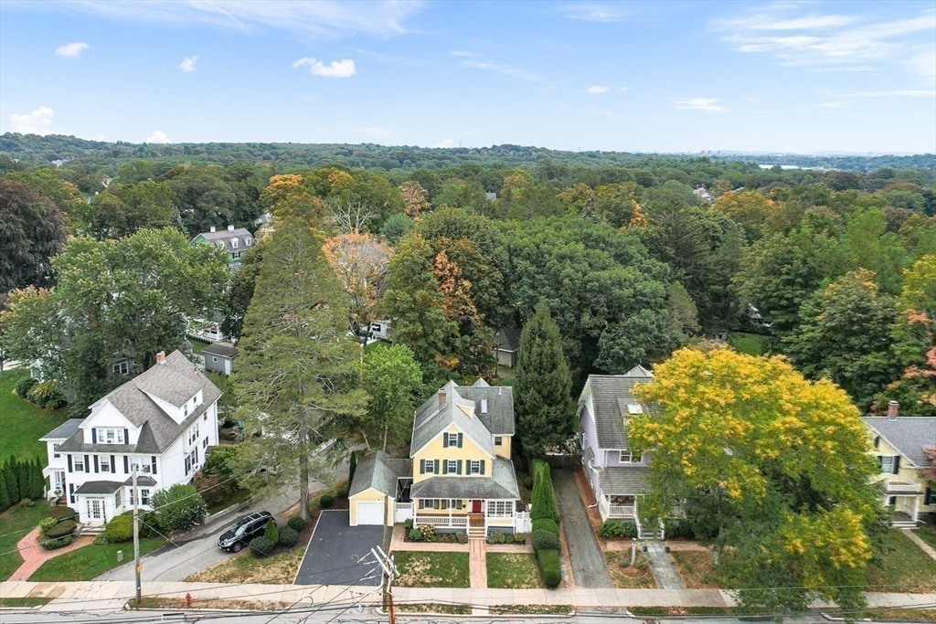 104 Church Street Winchester, MA 01890 - Photo 42 of 42 an aerial view of a house with a garden