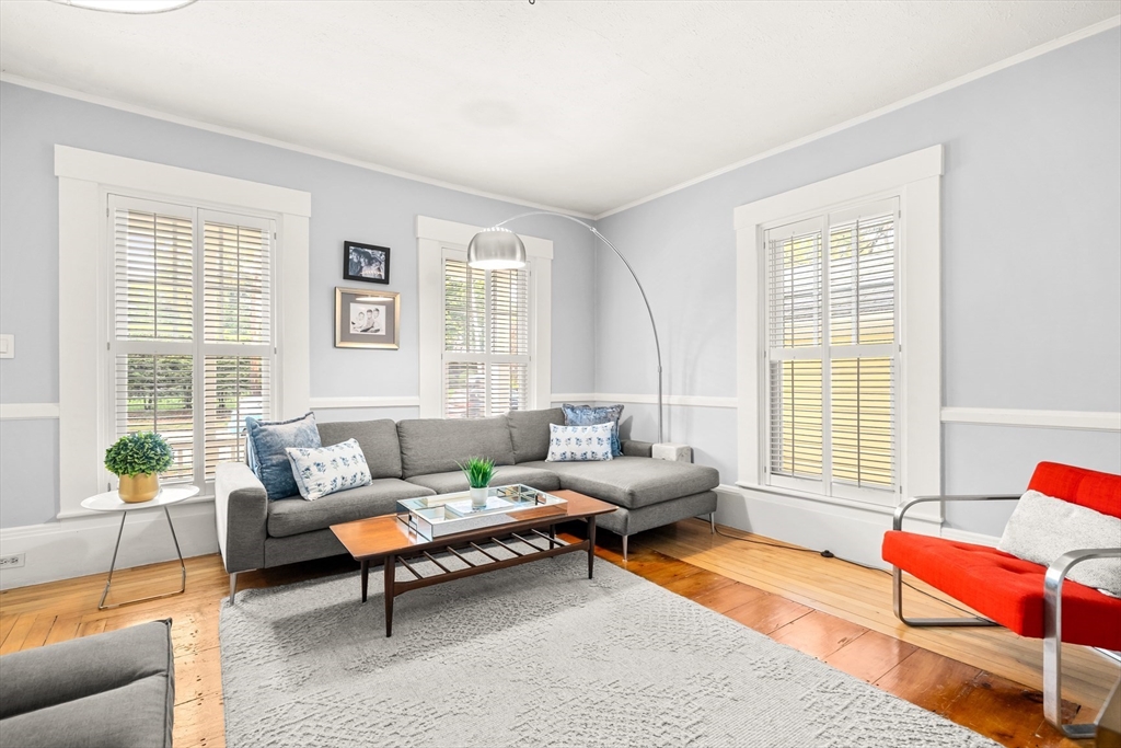 104 Church Street Winchester, MA 01890 - Photo 6 of 42 a living room with furniture and a window