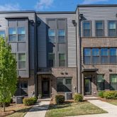 a front view of a building with street view