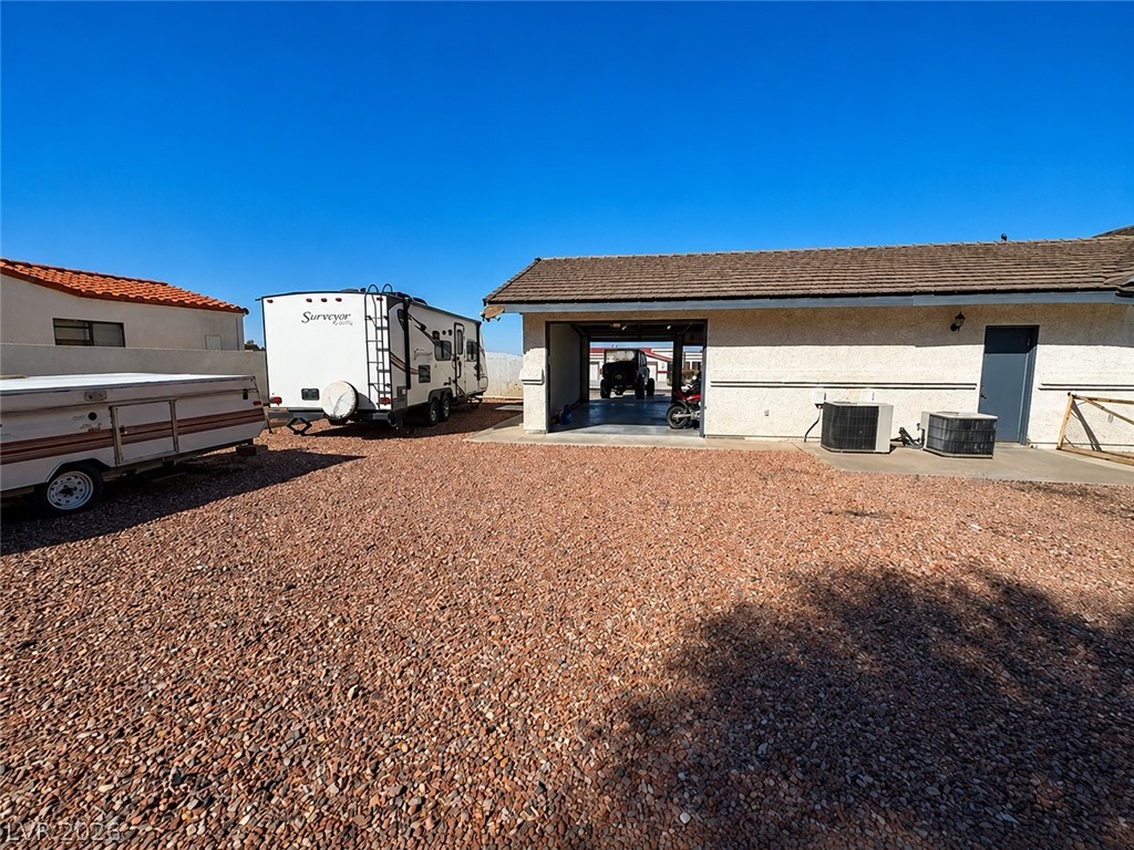 524 Swallow Cove Boulder City, NV 89005 - Photo 50 of 58 A spacious gravel lot provides ample parking and convenient storage for recreational vehicles.