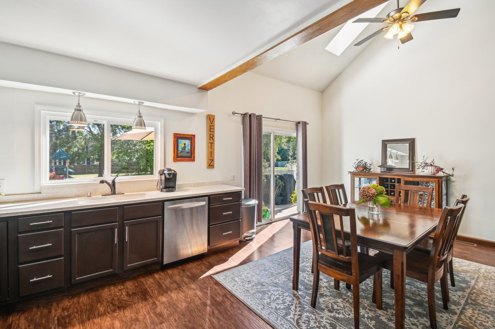 2900 Gabriel Avenue Zion, IL 60099 - Photo 13 of 52 a dining room with a wooden table and chairs