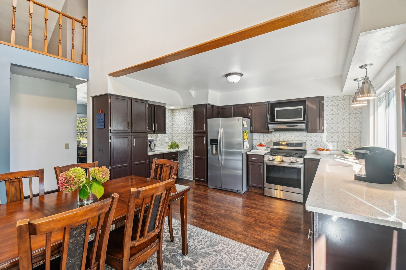 2900 Gabriel Avenue Zion, IL 60099 - Photo 15 of 52 a kitchen with stainless steel appliances wooden floor and refrigerator