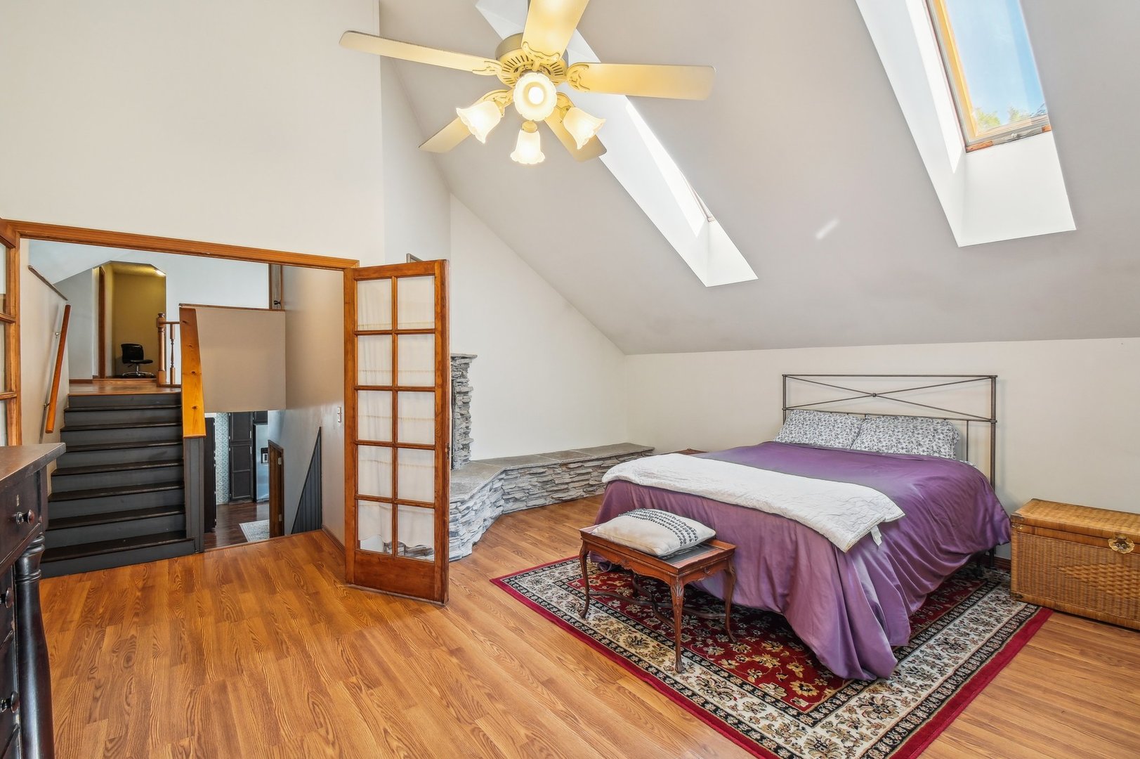 2900 Gabriel Avenue Zion, IL 60099 - Photo 28 of 52 a bedroom with a bed and a chandelier