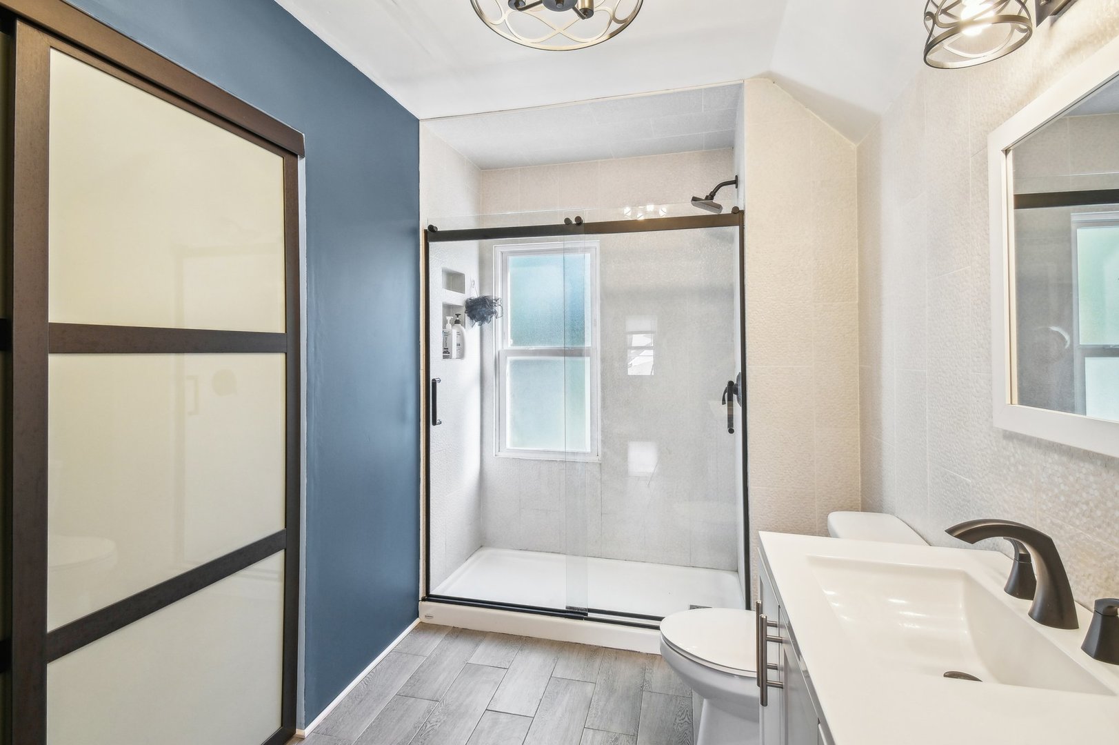 2900 Gabriel Avenue Zion, IL 60099 - Photo 36 of 52 a bathroom with a sink a toilet and shower