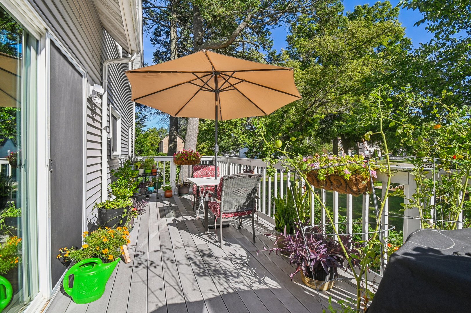 2900 Gabriel Avenue Zion, IL 60099 - Photo 7 of 52 a view of a balcony with chairs and an umbrella