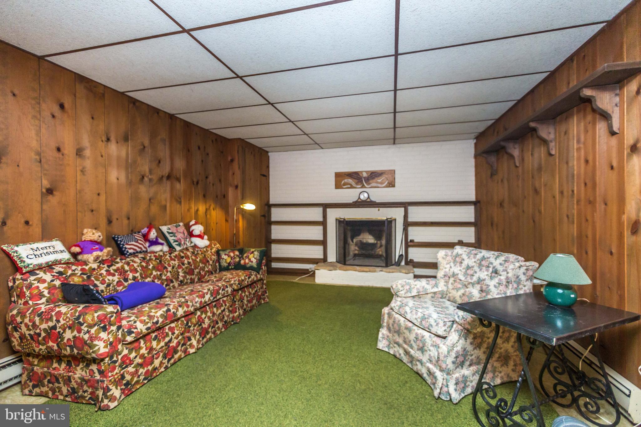 1915 Haverhill Road Baltimore, MD 21234 - Photo 26 of 35 Basement area includes a wood burning fireplace.