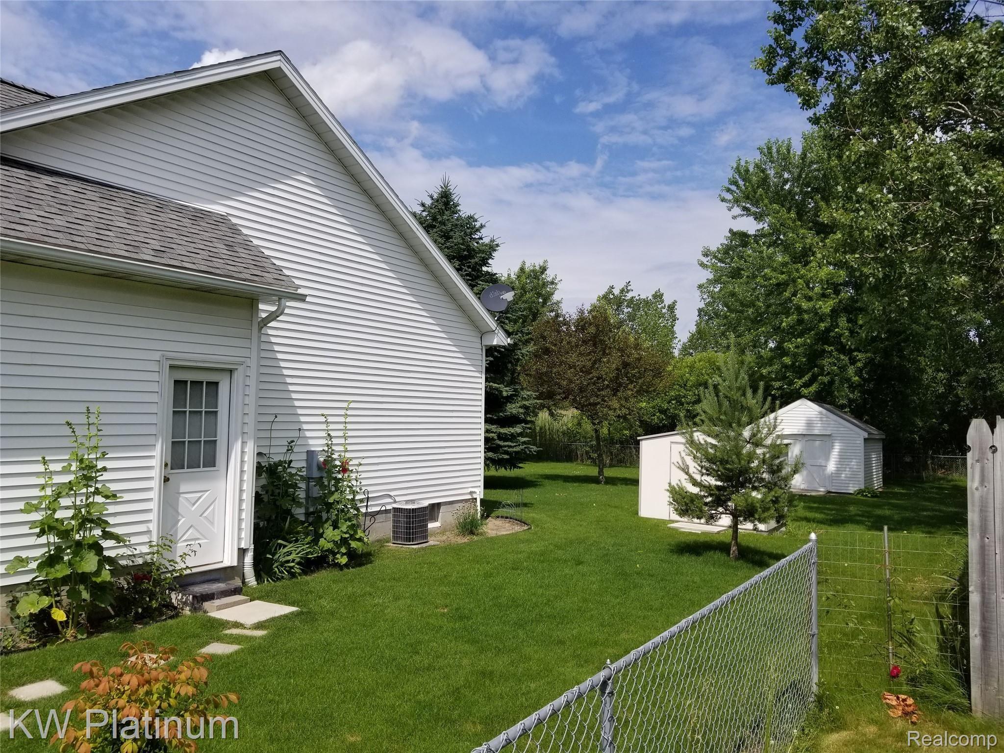 1310 Allen Road Smiths Creek, MI 48074 - Photo 5 of 27 SOUTH SIDE EXTERIOR VIEW