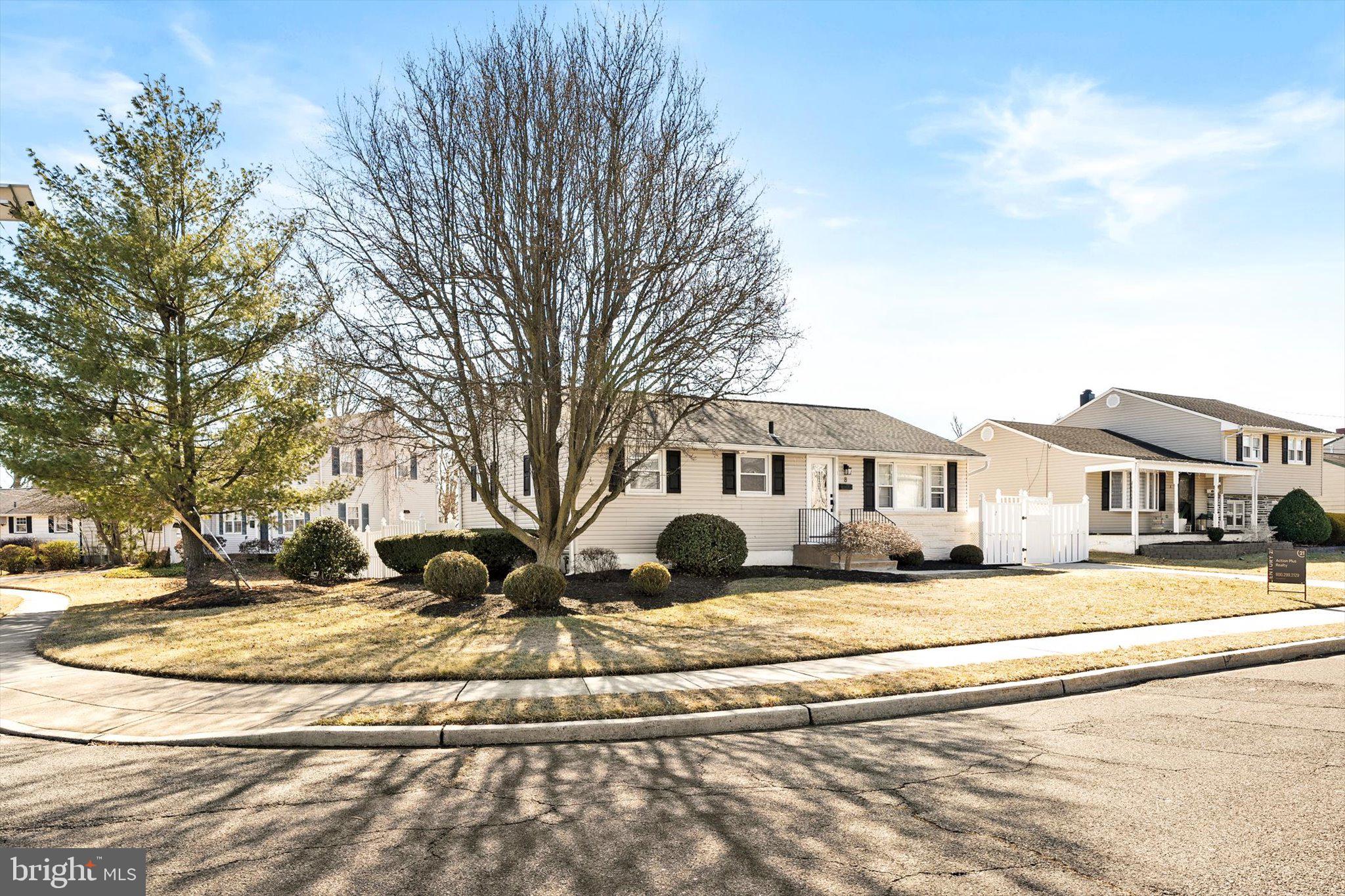 8 Roslyn Road Hamilton, NJ 08610 - Photo 3 of 23 a front view of a house with a yard