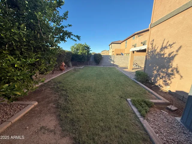 a view of outdoor space and yard