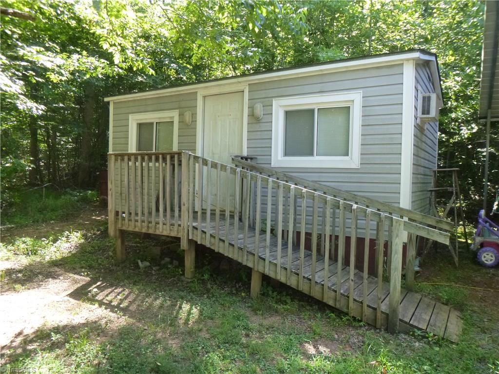 3057 Pierce Meadow Road Denton, NC 27239 - Photo 17 of 25 Building with power, a/c and a bathroom on property that could be used for a home business, bonus room, etc.