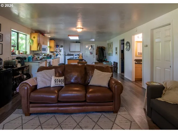 a living room with furniture and a couch