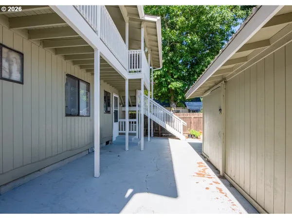 a view of a house with wooden stairs