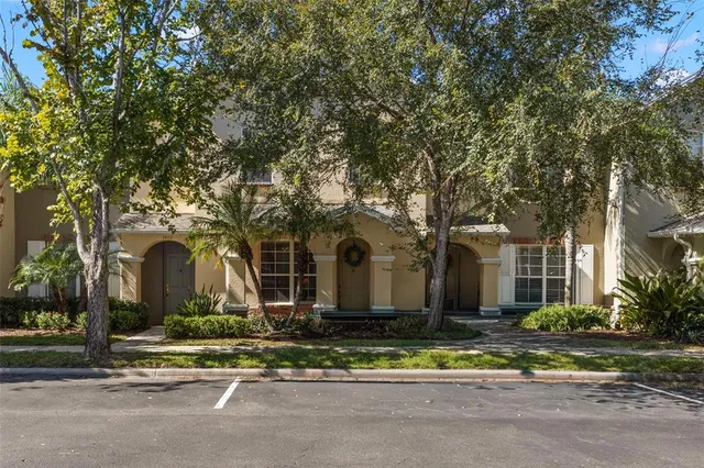 front view of a house with a small yard