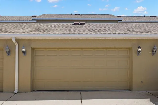 a view of granite countertop cabinets and sink