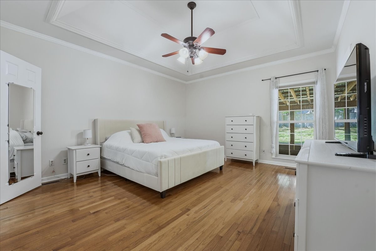 104 Kemper Court Springfield, TN 37172 - Photo 15 of 40 a bedroom with a bed and a large window