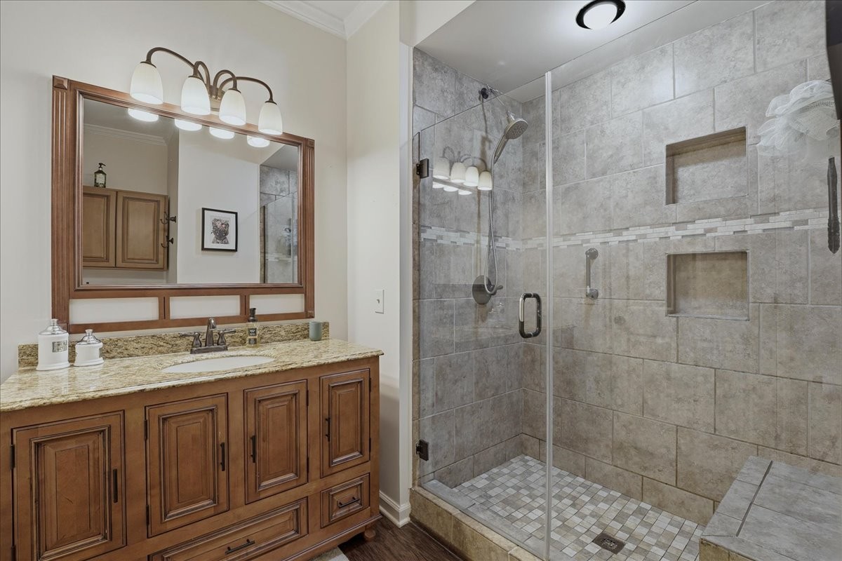 104 Kemper Court Springfield, TN 37172 - Photo 18 of 40 a bathroom with a sink a shower and a mirror