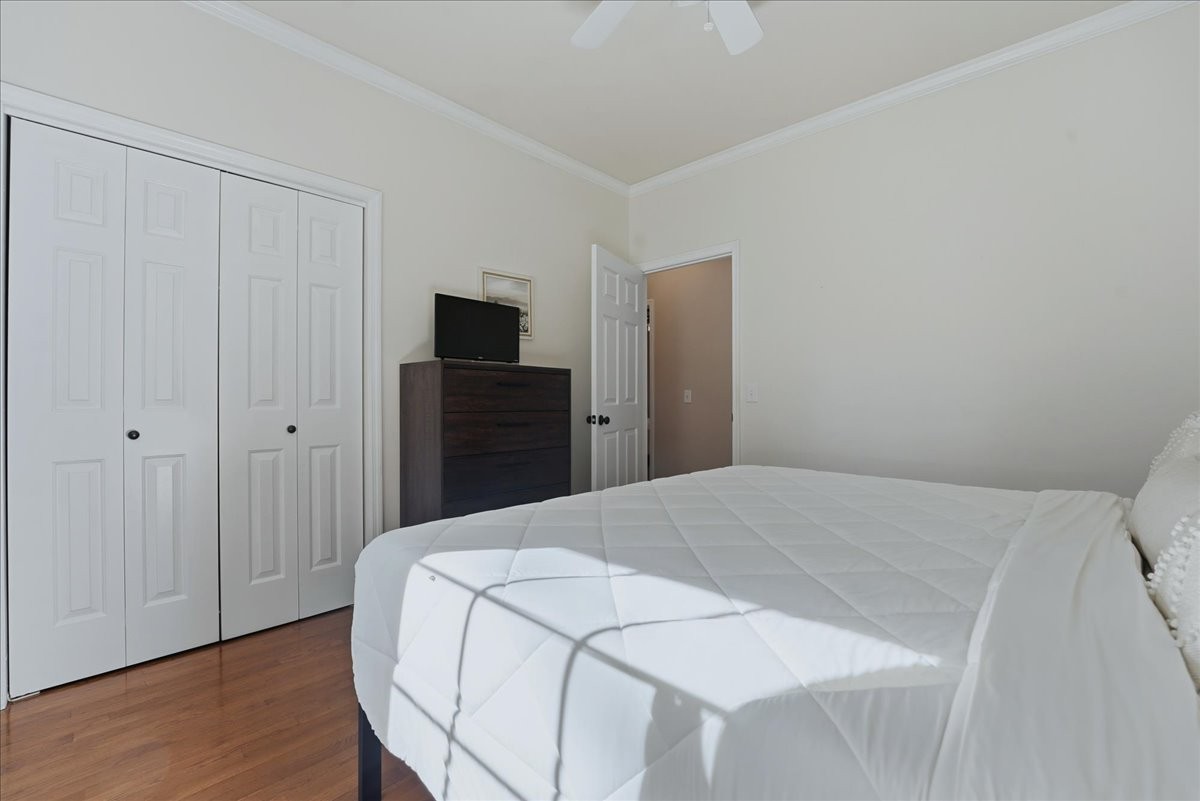 104 Kemper Court Springfield, TN 37172 - Photo 20 of 40 a bedroom with a bed and wooden floor
