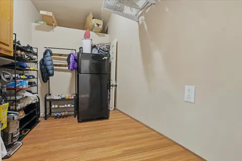 a view of storage and utility room with washer and dryer