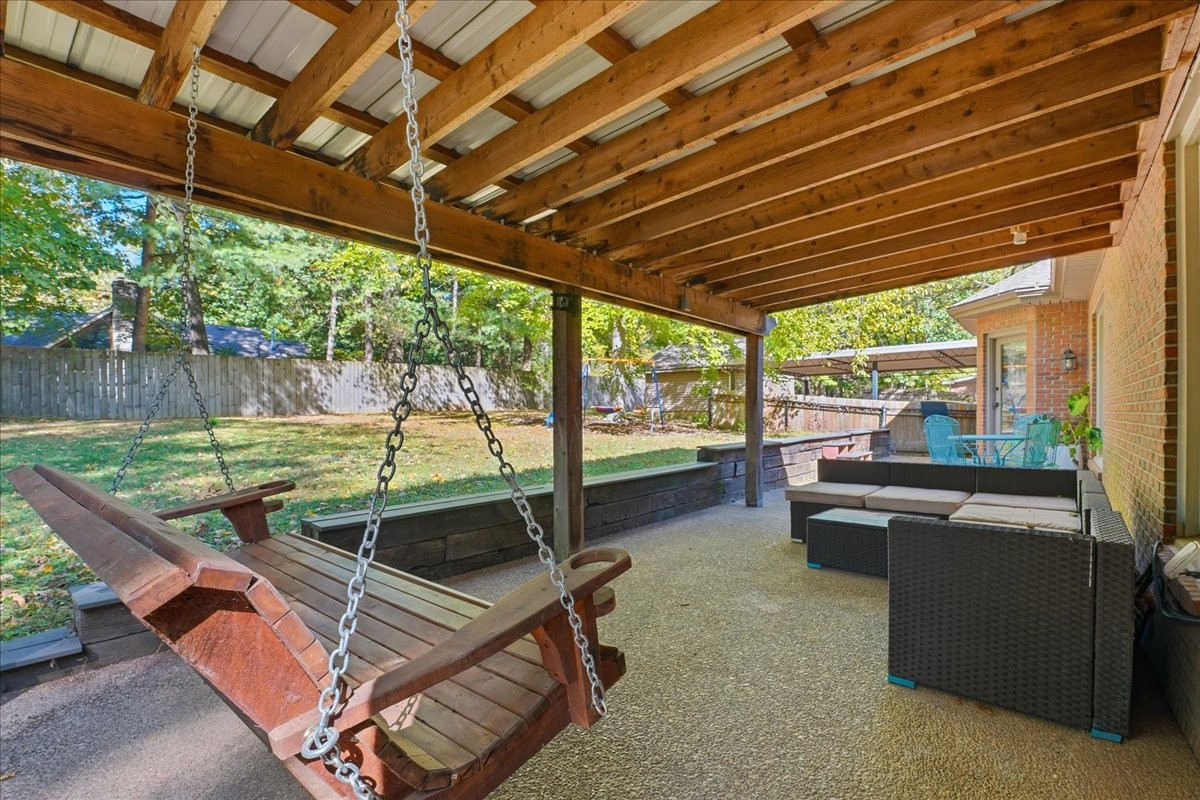 104 Kemper Court Springfield, TN 37172 - Photo 31 of 40 a view of a patio with a table and chairs