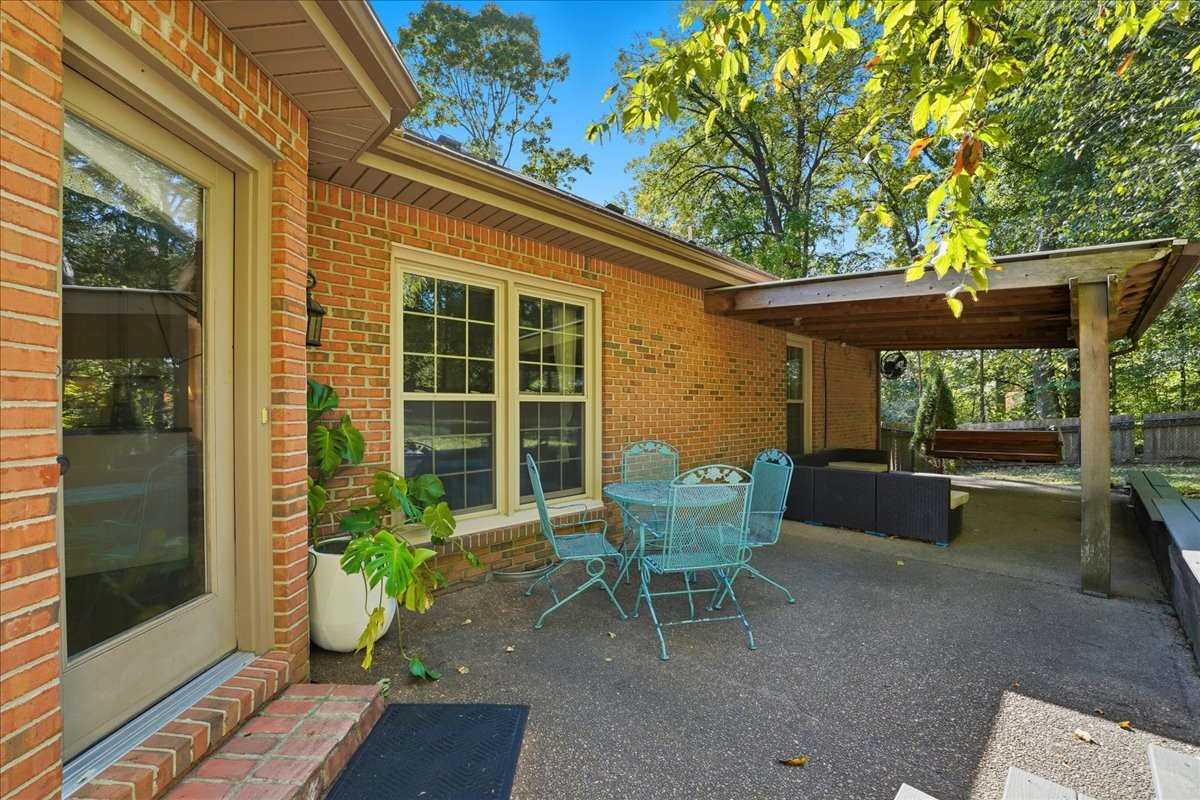 104 Kemper Court Springfield, TN 37172 - Photo 33 of 40 a view of a house with backyard sitting area and garden