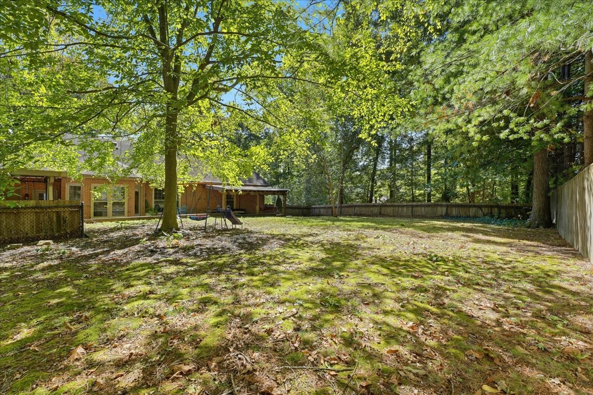 104 Kemper Court Springfield, TN 37172 - Photo 35 of 40 a backyard of a house with lots of green space