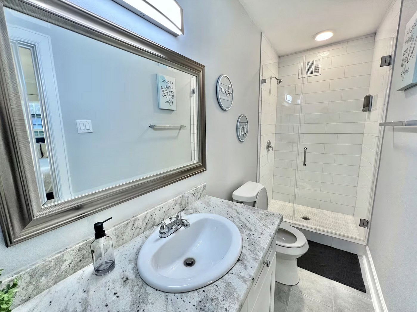 1508 Ridgewood Street, Unit A Houston, TX 77006 - Photo 12 of 16 a bathroom with a sink toilet and shower