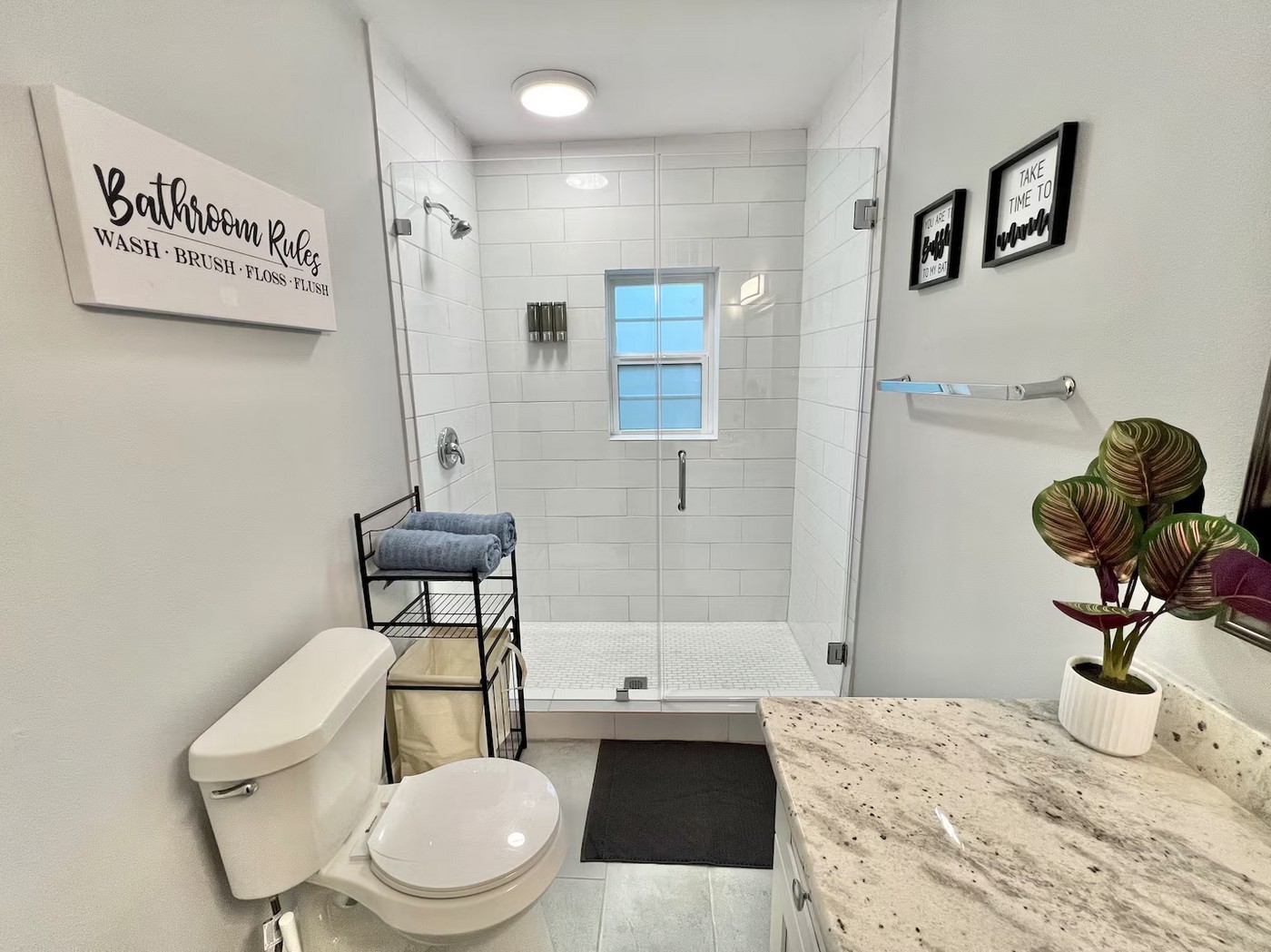 1508 Ridgewood Street, Unit A Houston, TX 77006 - Photo 13 of 16 a bathroom with a toilet sink and mirror