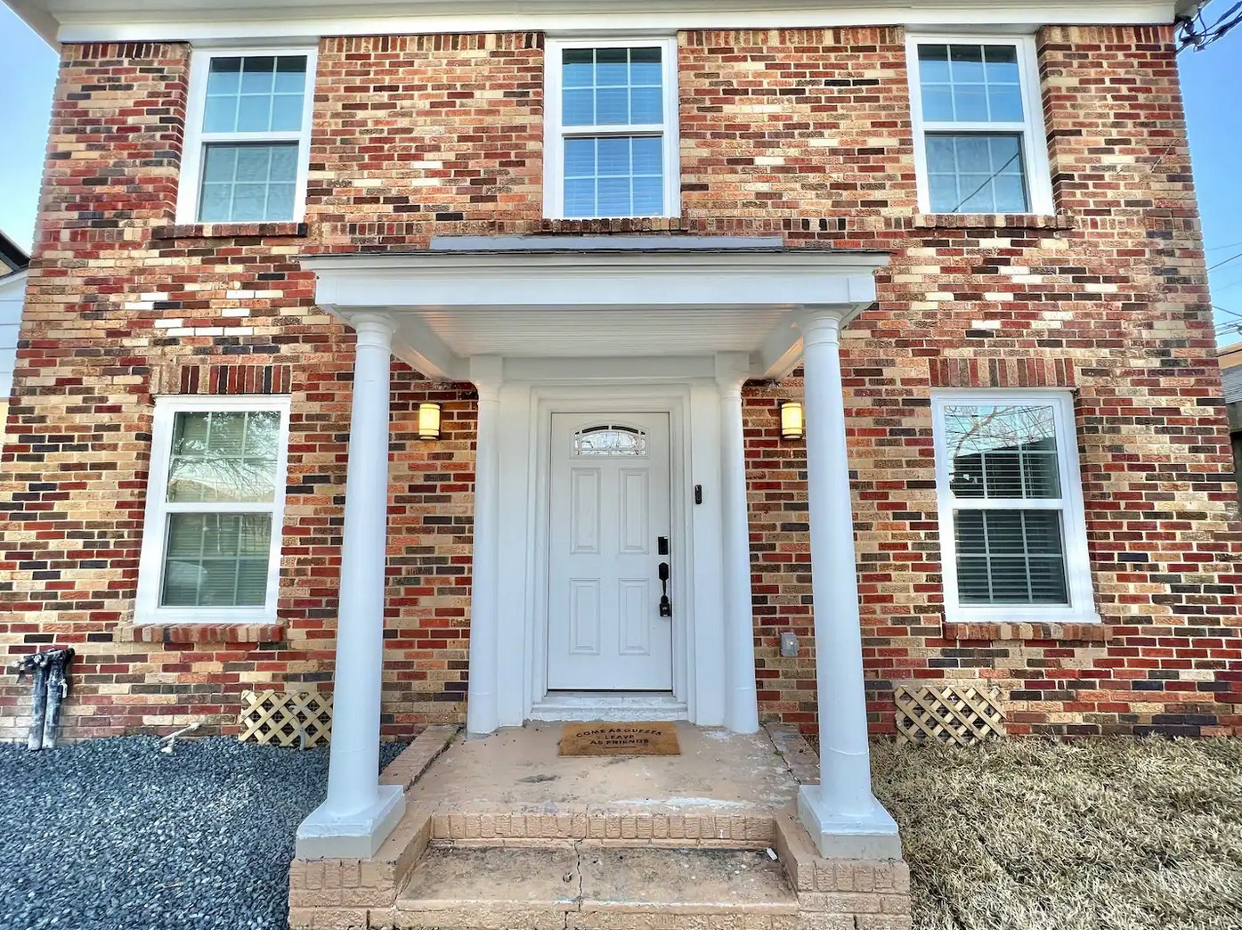 1508 Ridgewood Street, Unit A Houston, TX 77006 - Photo 16 of 16 front view of a brick house with a large windows