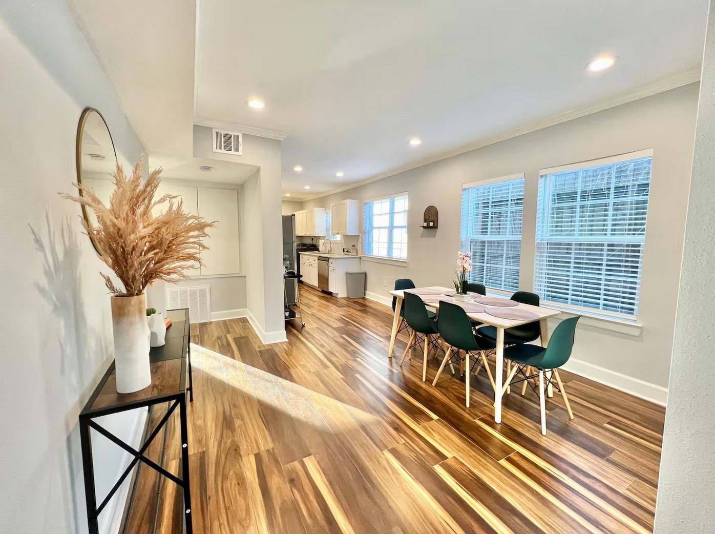 1508 Ridgewood Street, Unit A Houston, TX 77006 - Photo 5 of 16 a view of a dining room with furniture window and wooden floor