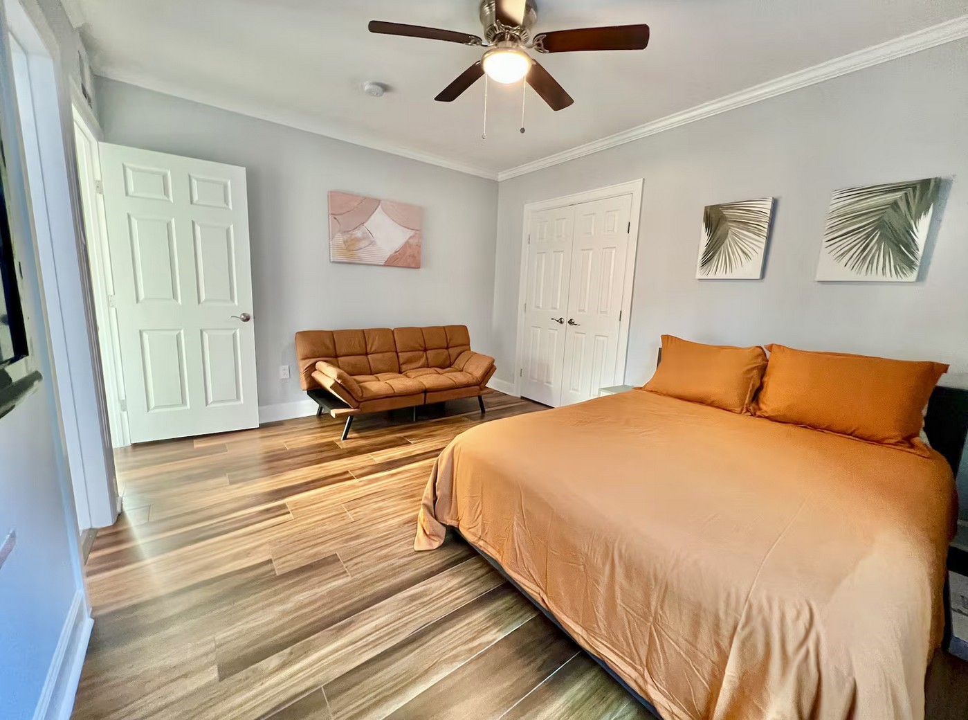 1508 Ridgewood Street, Unit A Houston, TX 77006 - Photo 8 of 16 a bedroom with two beds and painting on the wall