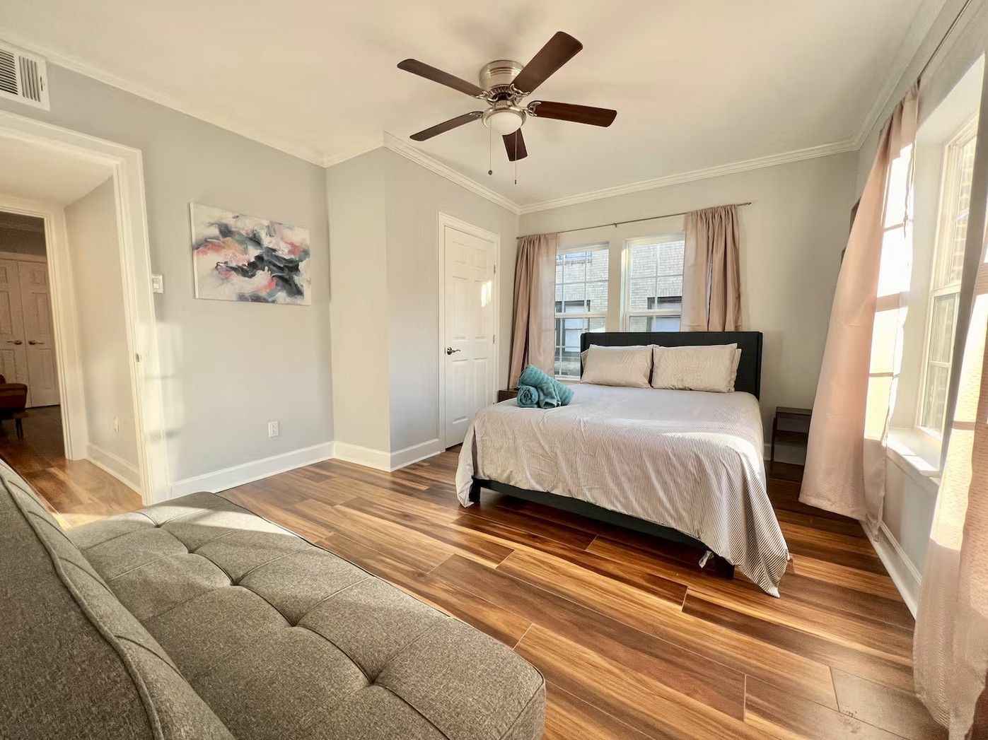 1508 Ridgewood Street, Unit A Houston, TX 77006 - Photo 10 of 16 a bedroom with a large bed and a window