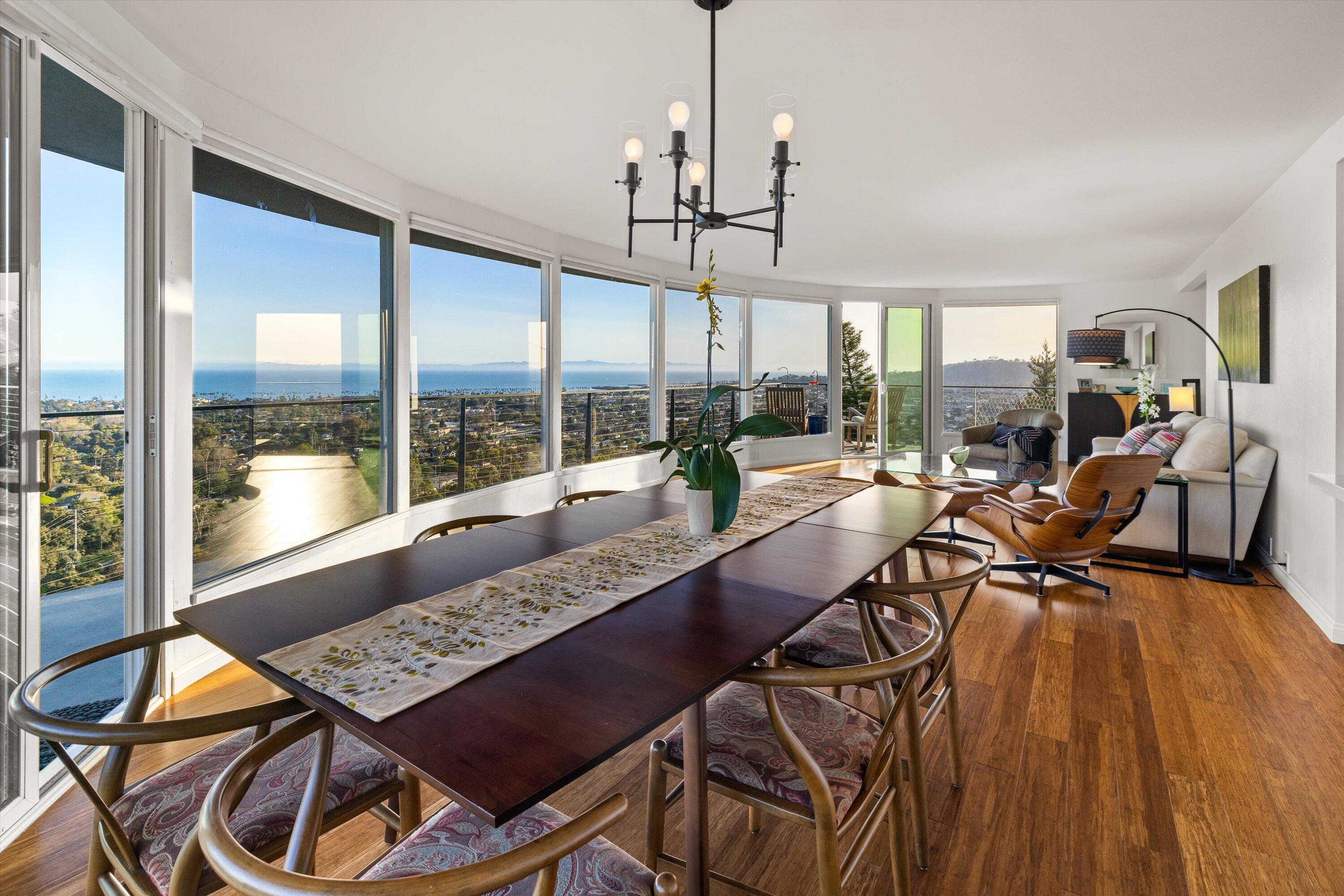 128 Las Alturas Road Santa Barbara, CA 93103 - Photo 18 of 36 a view of a dining room with furniture window and outside view