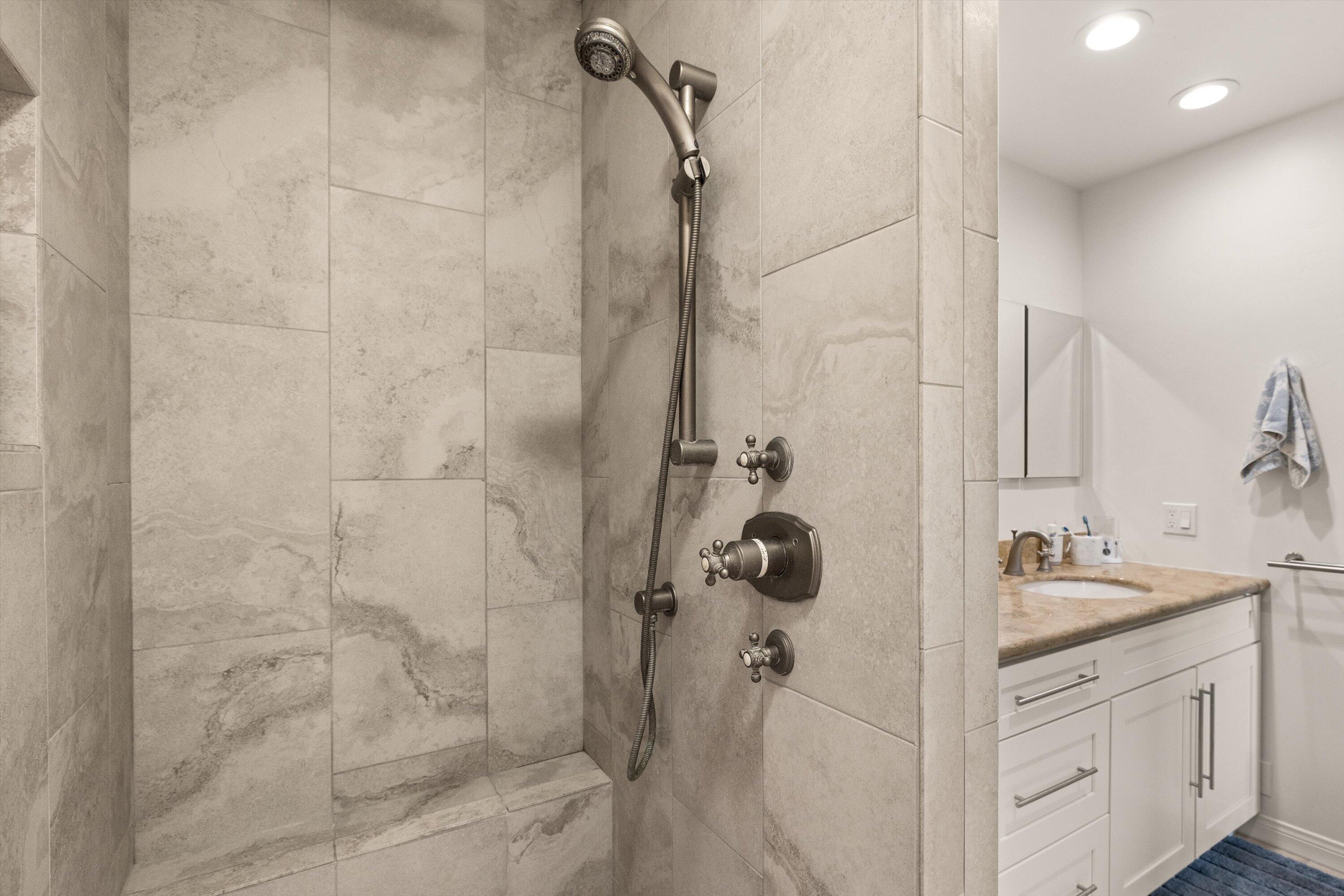 128 Las Alturas Road Santa Barbara, CA 93103 - Photo 29 of 36 a bathroom with a double sink shower and a mirror